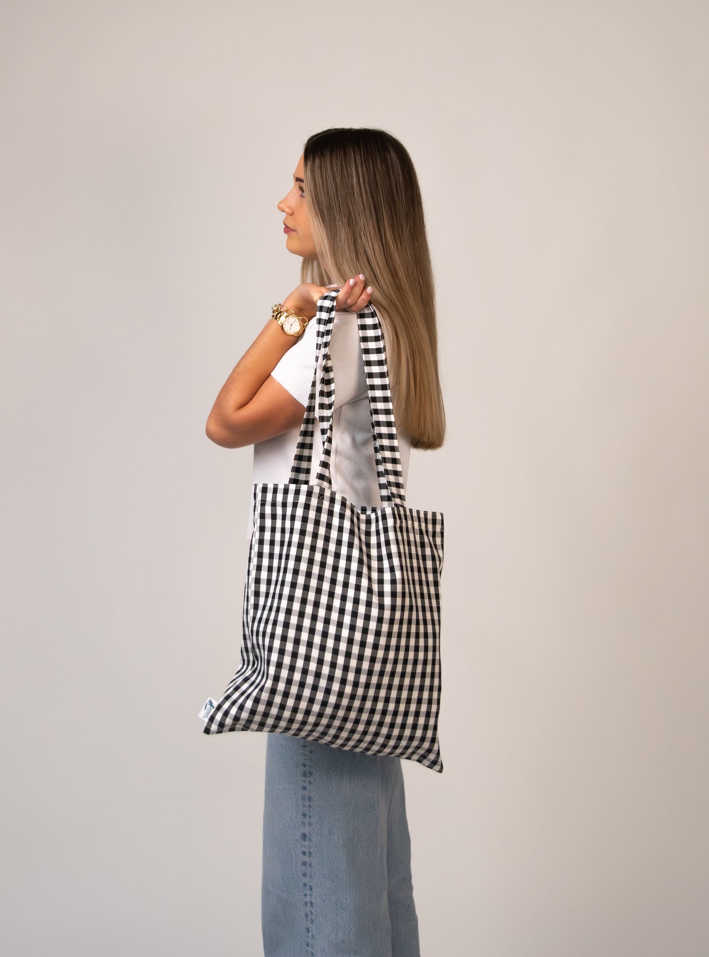 Over-shoulder pose with Amalfi Jetset tote bag