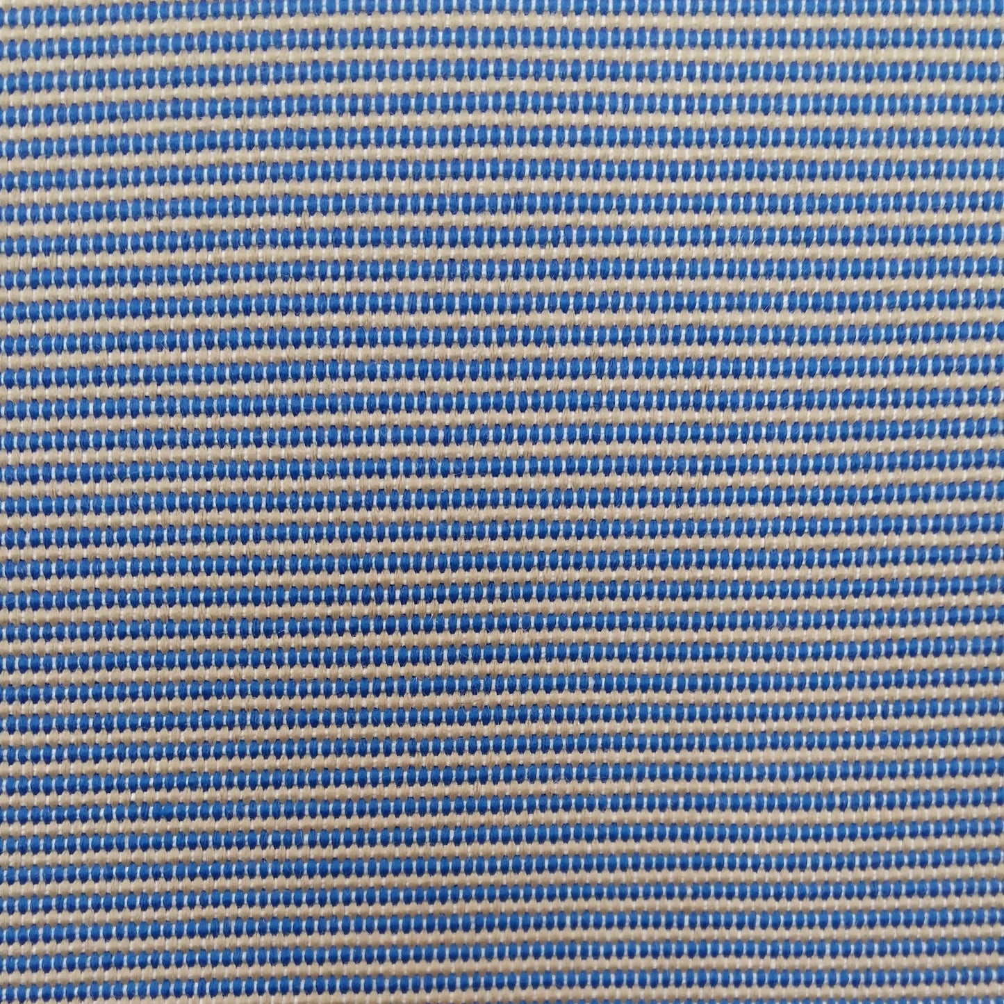 Deva offers bold blue character with a soft texture. Water-resistant, UV-stable, and ideal for poolside cushions or café seating.