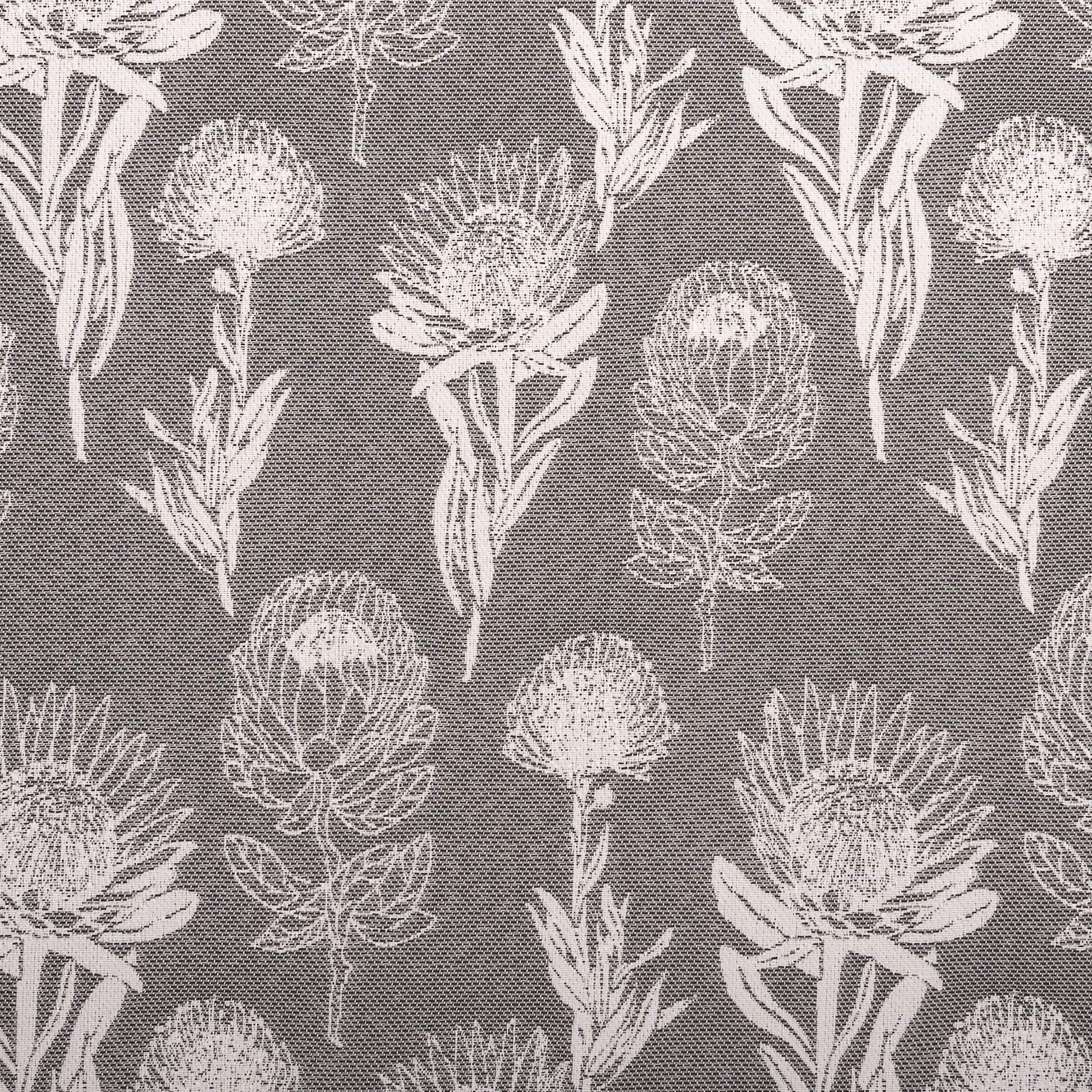 Carbon is a striking charcoal fabric with bold floral contrast. Built for high-traffic use, it’s a go-to for contemporary patios and city balconies.