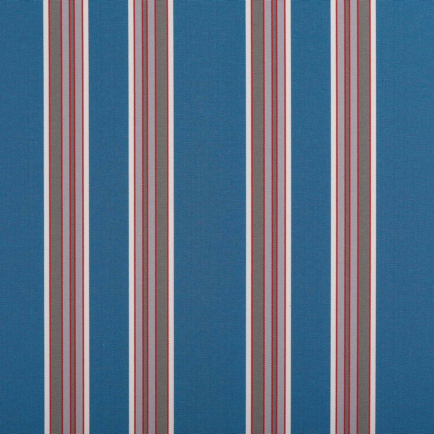 Blue fabric with thin red, white, and grey vertical stripes spaced evenly across the surface.