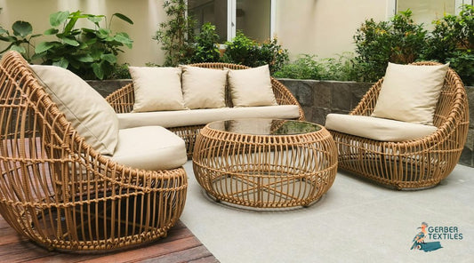 Outdoor wicker furniture with beige cushions using Gerber Textiles fabric, ideal for patios and hospitality.